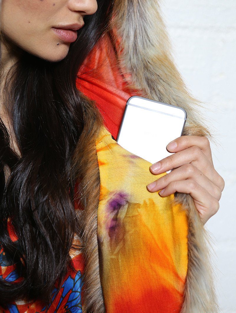 Woman wearing faux fur Sun Kissed Red Fox Collector SpiritHood, side view 1