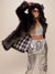 Woman wearing Black Wolf Plaid Classic Faux Fur Coat, side view 1
