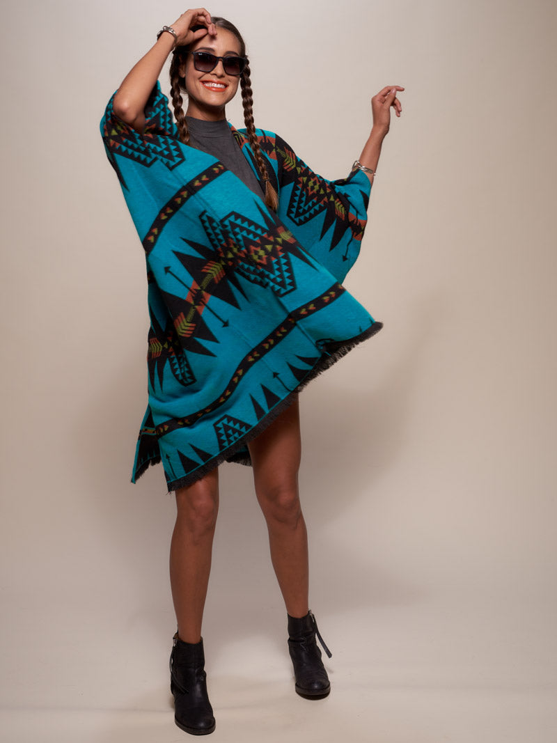 Woman wearing Grey Wolf Fabric Poncho, front view