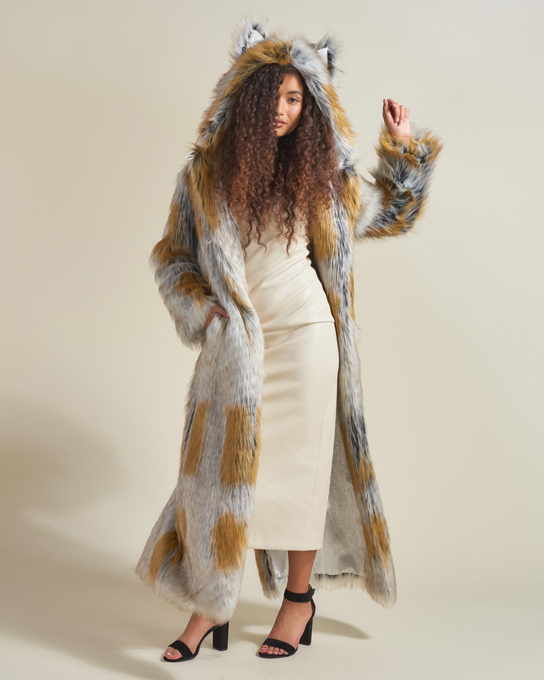 Woman wearing Arctic Fox Classic Faux Fur Long Coat, front view 4