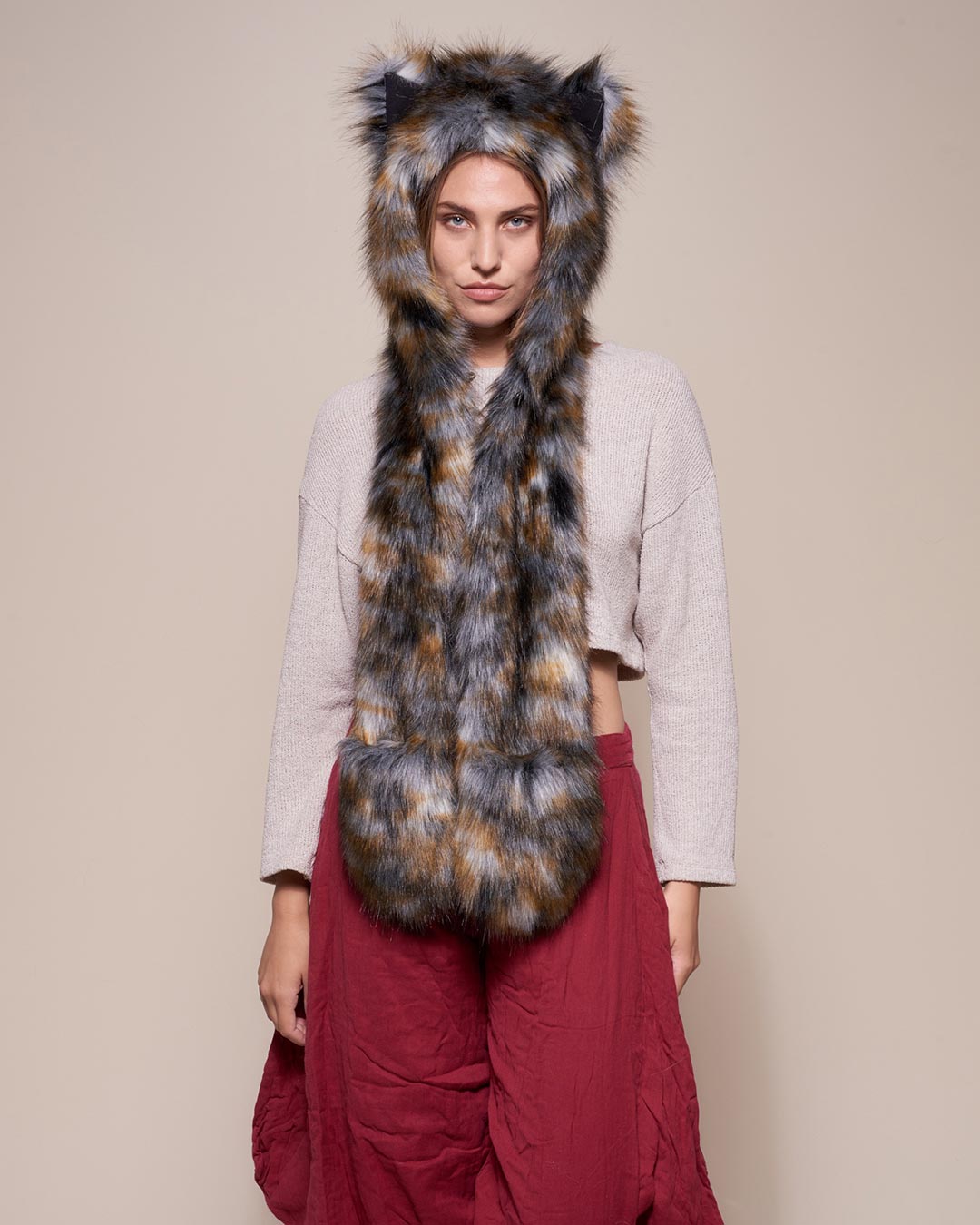 Woman wearing Brindle Wolf Collector Edition Faux Fur Hood, front view