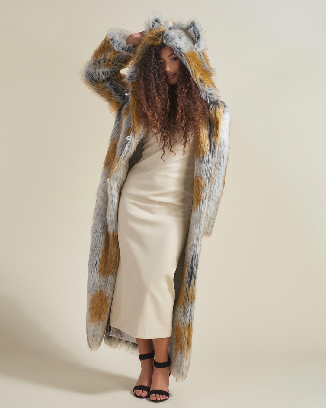 Woman wearing Arctic Fox Classic Faux Fur Long Coat, front view 7