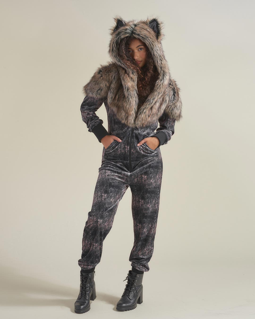 Woman wearing Grazer Wolf Artist Edition Faux Fur Animal Onesie, front view 6
