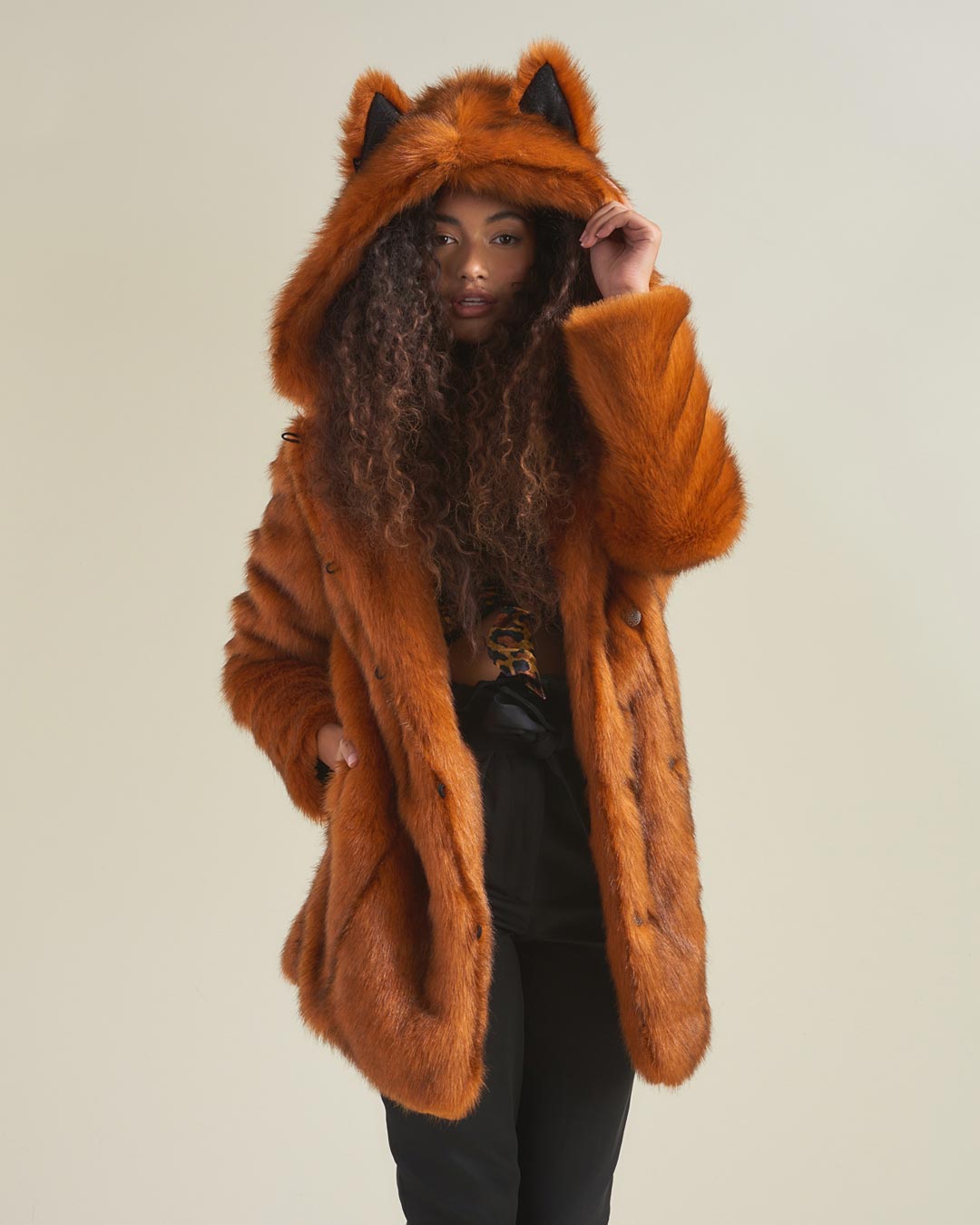 Woman Wearing VAMP Wolf Artist Edition Hooded Faux Fur Coat 
