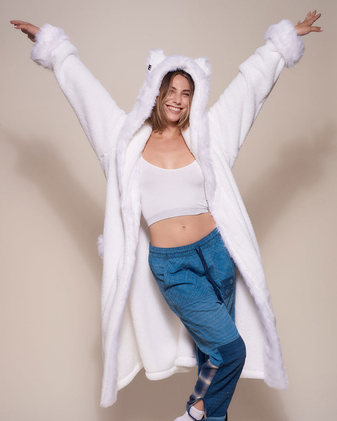Woman wearing Arctic Wolf Classic Faux Fur Robe, side view 1