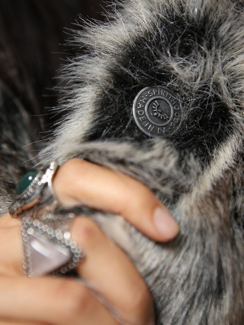 Woman wearing faux fur BlackMilk Galaxy Grey Wolf Coat