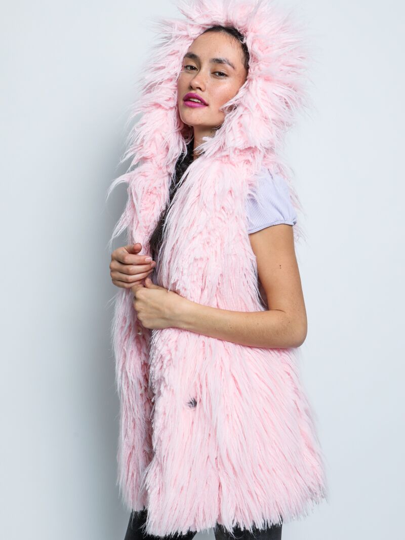 Woman wearing Flamingo Faux Fur Vest, side view