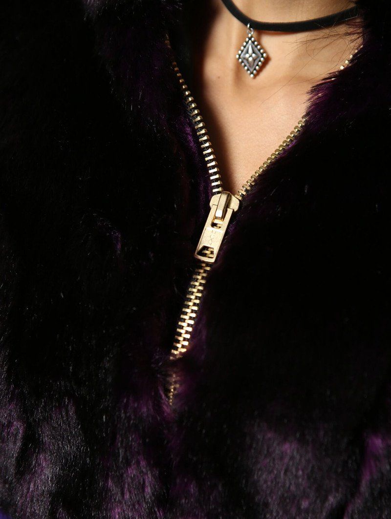 Woman wearing faux fur Midnight Purple Wolf Crop Jacket