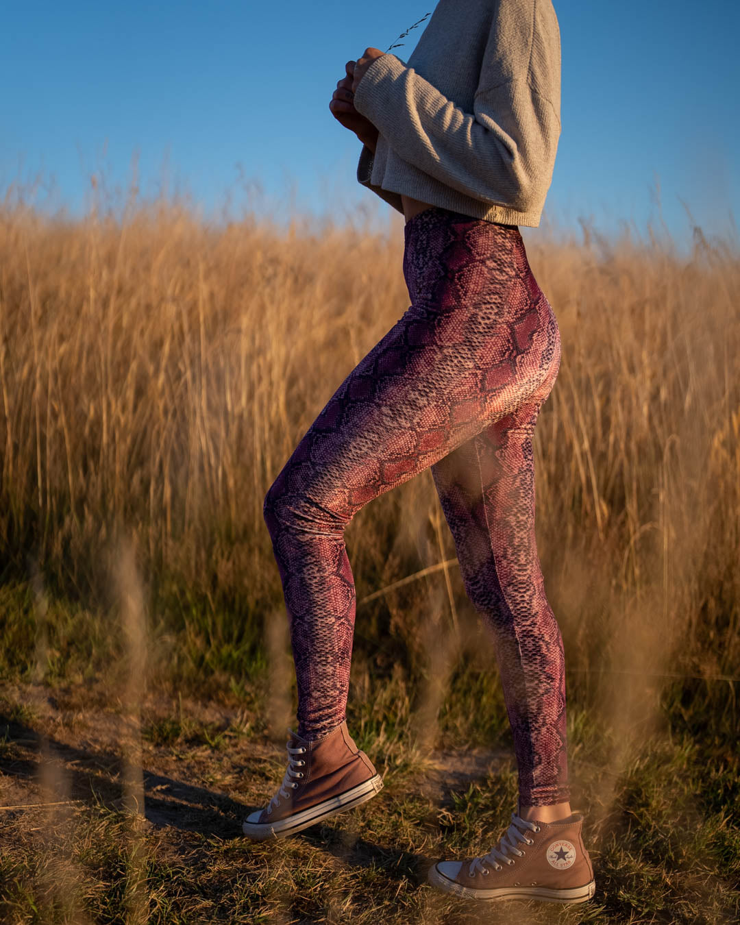 Pink Python High-Waisted Velvet Leggings on Female Model