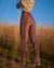 Back View of Pink Python High-Waisted Velvet Leggings on Woman