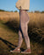 Side View of Rattlesnake High-Waisted Velvet Leggings on Woman