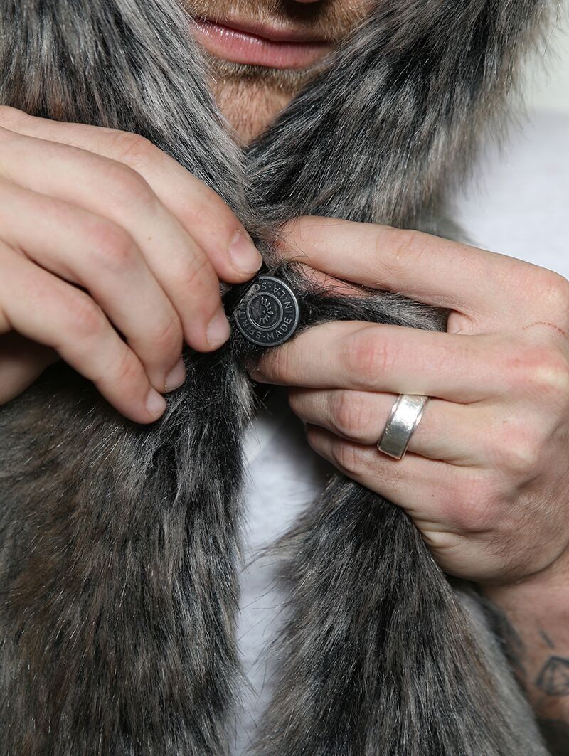 Man wearing faux fur New Moon Grey Wolf Collector SpiritHood, front view 1