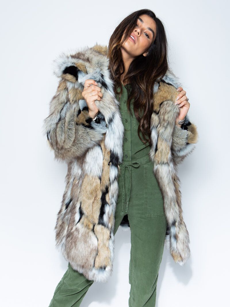 Woman Wearing Hooded Faux Fur Coat in Wolverine Design